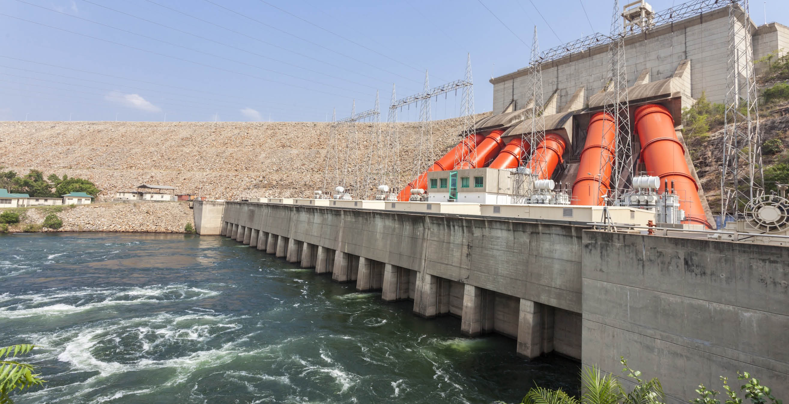 Industrial port with orange cranes